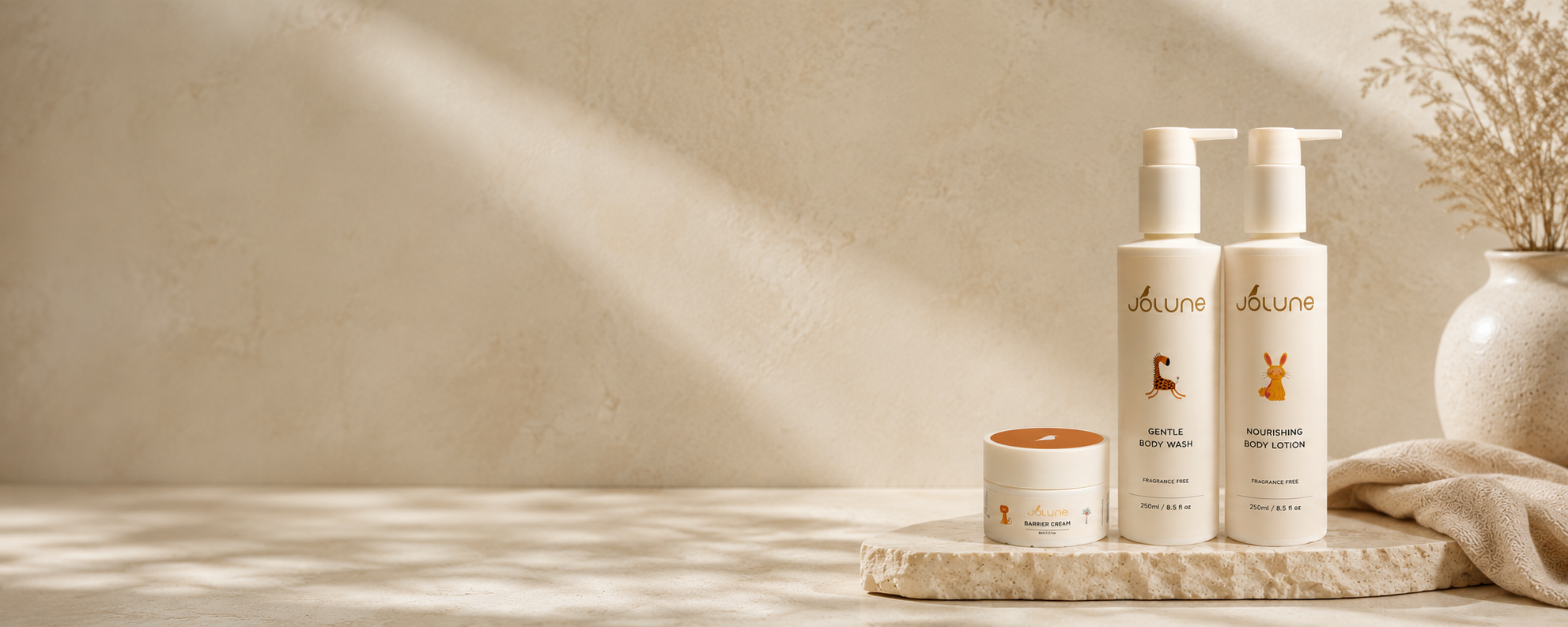 Jolune baby skincare collection featuring Gentle Body Wash, Nourishing Body Lotion, and Barrier Cream for delicate and sensitive skin.